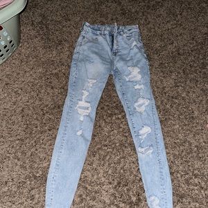 light washed high waisted ripped American Eagle skinny jeans